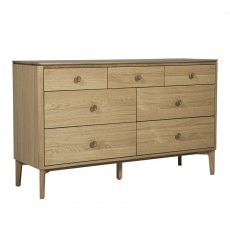 Adaline Oak Wide 7 Drawer Chest Adaline Oak Wide 7 Drawer Chest